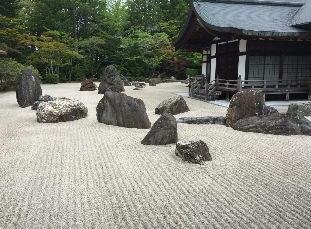 Photo by <a href="https://unsplash.com/@heavypen?utm_source=unsplash&utm_medium=referral&utm_content=creditCopyText">Ray Wyman Jr</a> on <a href="https://unsplash.com/photos/a-japanese-garden-with-rocks-and-a-building-OmY2XArLKcs?utm_source=unsplash&utm_medium=referral&utm_content=creditCopyText">Unsplash</a>